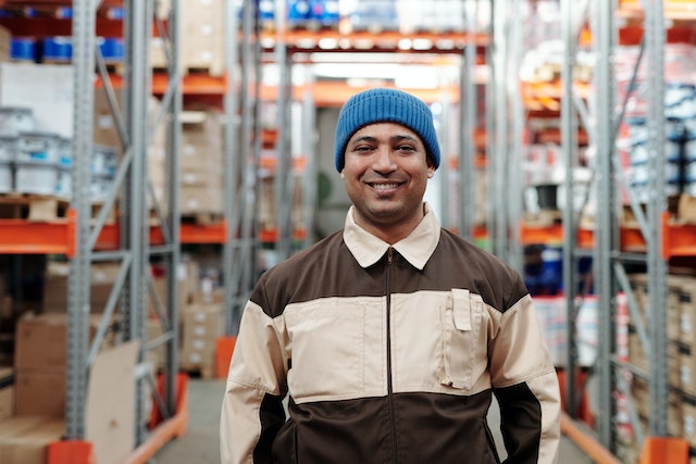 Man standing in a logistics warehouse